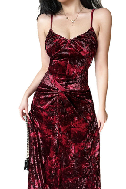 Red velvet dress worn by a model on a white background