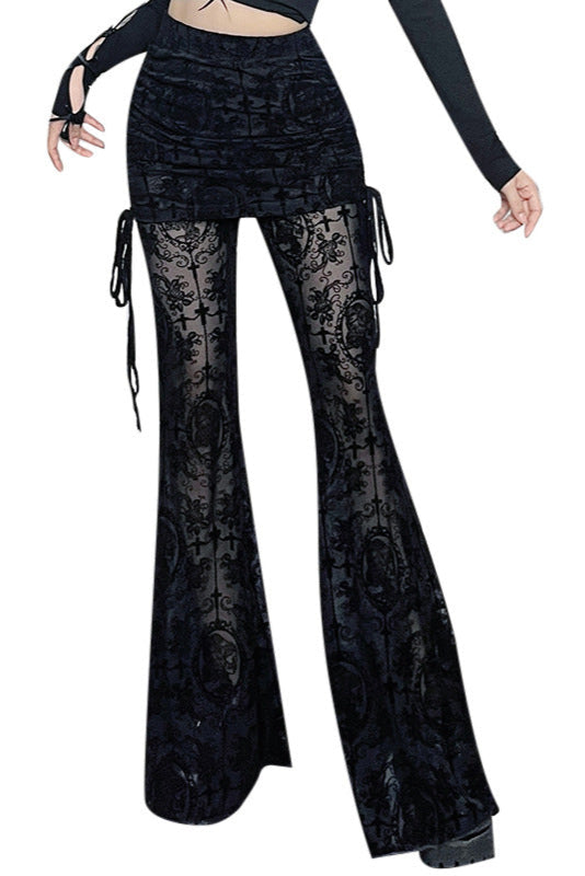 Black lace pants worn by a person on a white background