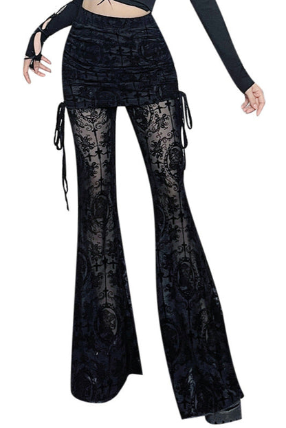 Black lace pants worn by a person on a white background