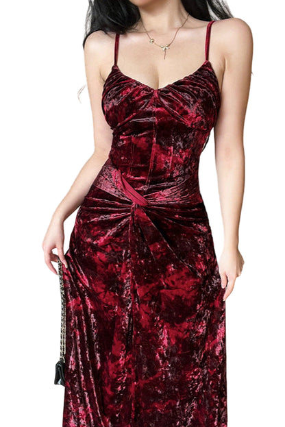 Red velvet dress worn by a person with a neutral background